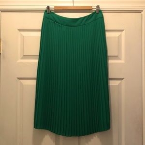 Emerald/Kelly green, knee/midi length, pleated skirt